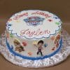 CB-009H: Round birthday cake with Paw Patrol logo, colorful paw prints, and characters. “Happy Birthday Jaylen” is written on top in blue and red icing. Cake is presented on a silver tray.