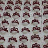 Neatly arranged CO-003 Red Velvet 1X1 Bites feature square pastries topped with white cream swirls and dark red decorative icing, all set on a white frosting background.
