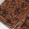 Two CO-130 Half Sheet Brownies, generously topped with mini chocolate chips, are displayed on a light marble surface.
