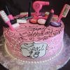 The BD-028B Makeup/Hair is a pink birthday cake with fondant makeup and hair styling decorations, white swirls, a “Lexi 18” plaque, and “Happy Birthday” elegantly scripted on top.