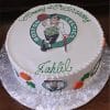The ST-005 Celtics round birthday cake features the Boston Celtics logo, green "Happy 15th Birthday Jahlil" writing, plus basketball and shamrock decorations on the sides.